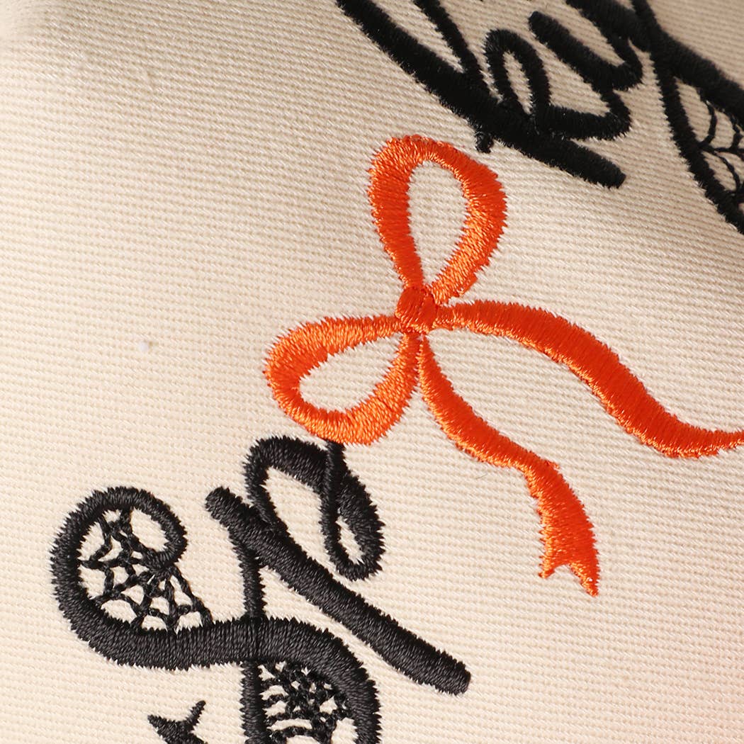 SPOOKY Bow Embroidered Two-Tone Leaf Brim Trucker Hat