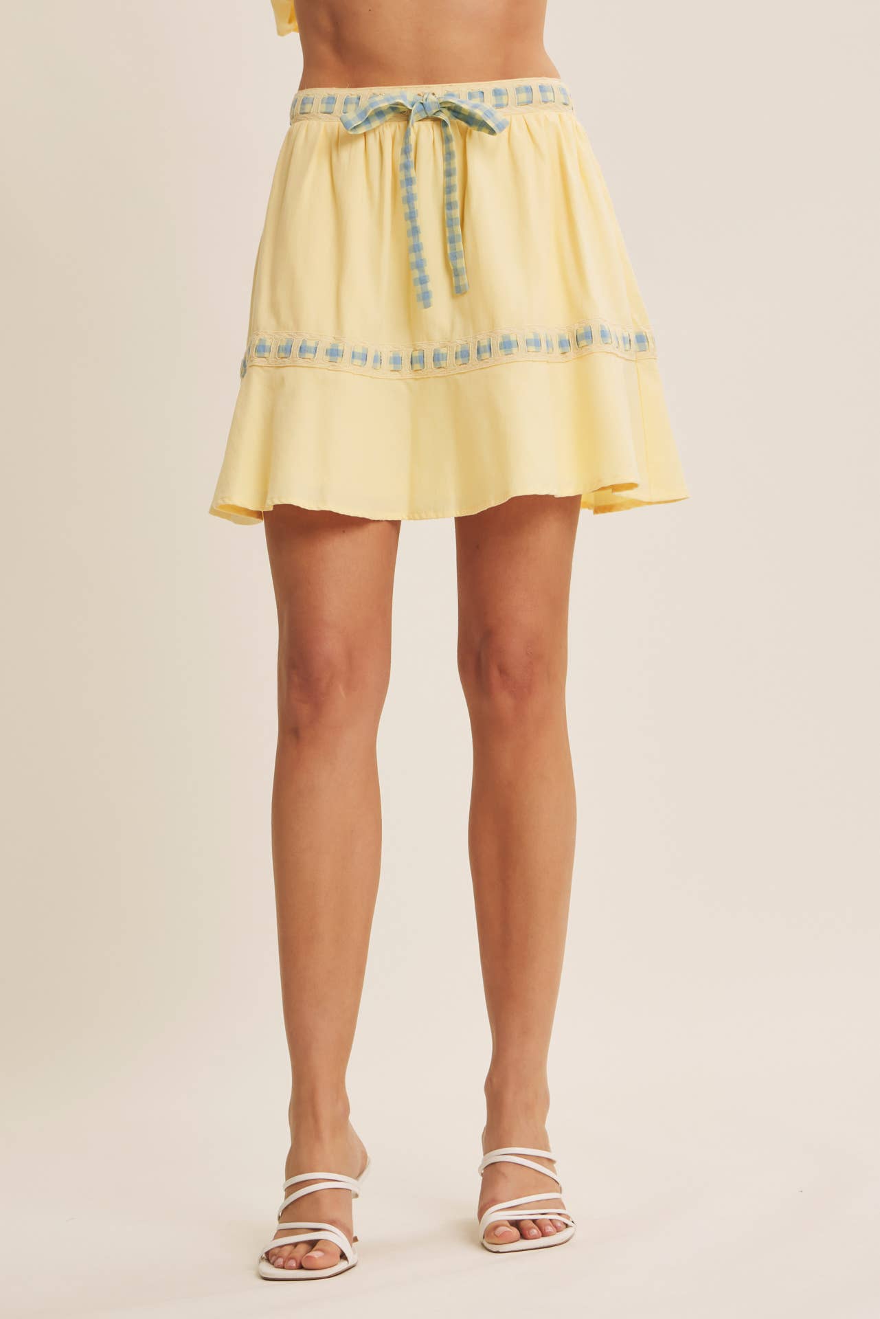 FRESH AND TIMELESS GINGHAM BOW FLARE MINI SKIRT